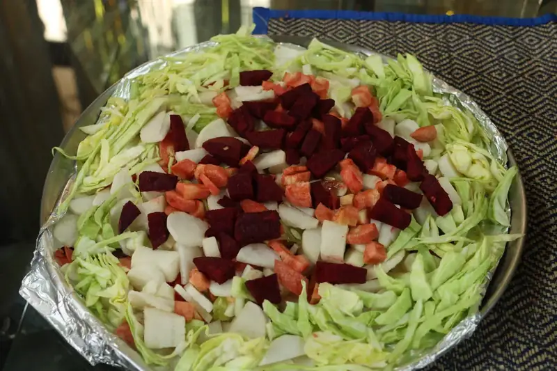 Fresh chopped salad of cabbage, beetroot, carrot and radish at Sri Yoga Ashram Rishikesh