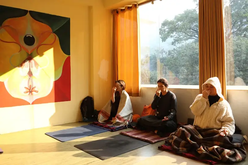 Students practicing yoga in Rishikesh